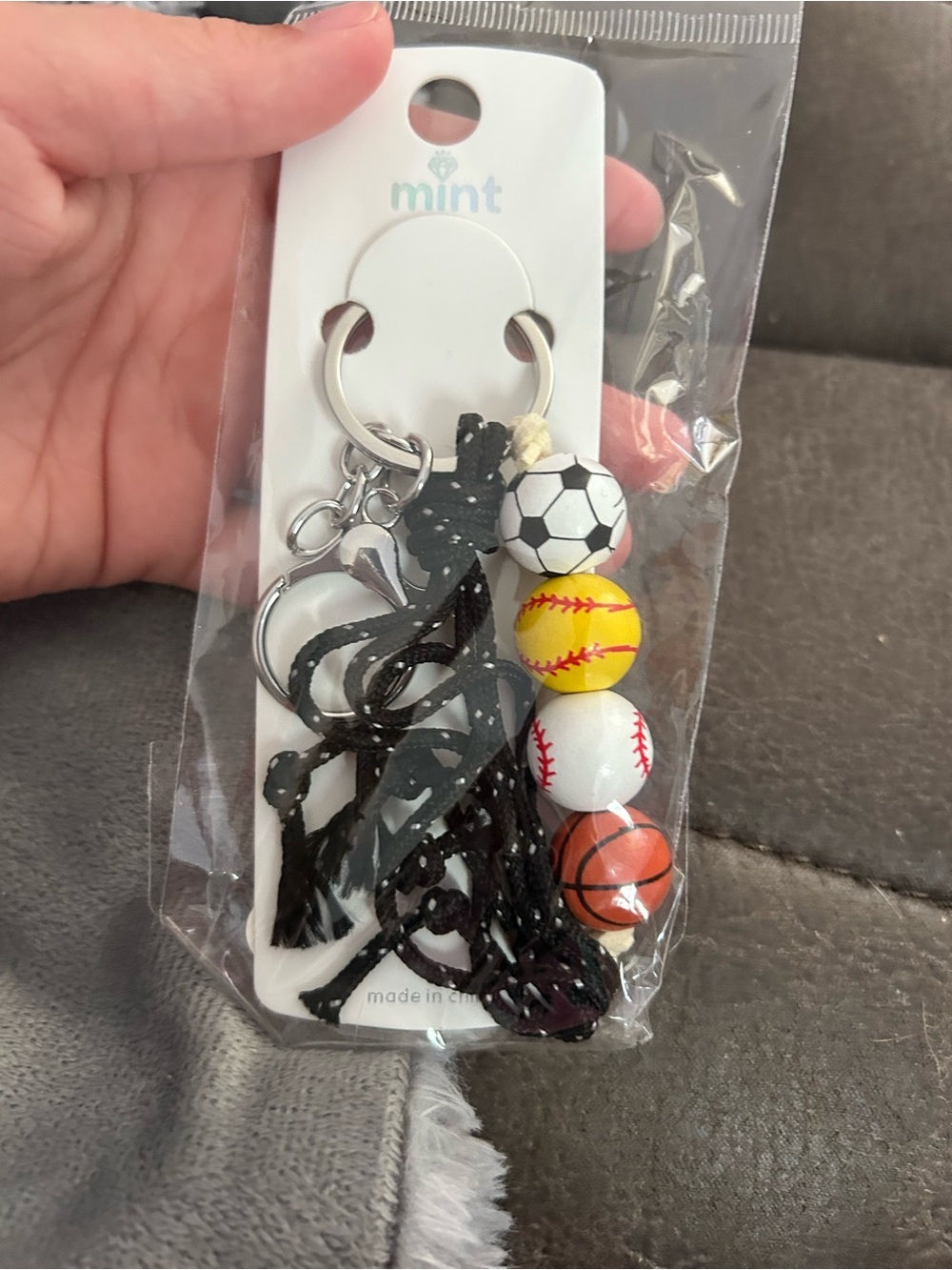 5/$25 mint Kids Sports Bead Keychain - Black with White, Yellow, Orange Accents